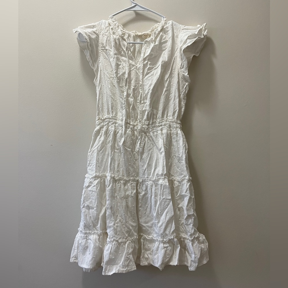 White mid thigh to knee length dress